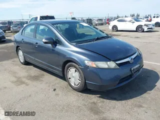 2008 Honda Civic Hybrid with VIN JHMFA36258S031535, listed as a IAAI auction lot 41888669 with 257,739 mi miles. Bid and sale history available at carsss.com. Image 1.