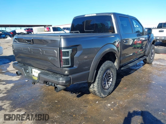 2020 Ford F-150 Raptor with VIN 1FTFW1RG7LFB08650, listed as a IAAI auction lot 40992485 with 102,115 mi miles and . Bid and sale history available at carsss.com. Image 4.