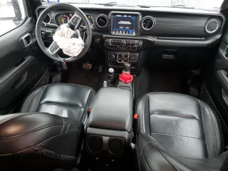 2023 Jeep Wrangler Sahara z VIN 1C4JJXP62PW514489, wystawiony jako Copart lot #51811585 z przebiegiem 39 174 mil mil oraz Szkoda całkowita • Salvage title. Historia ofert i sprzedaży dostępna na DreamBid. Obrazek 8.