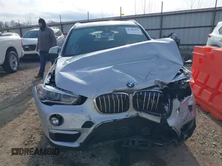 2019 BMW X1 sDrive28i with VIN WBXHU7C52K3H44360, listed as a IAAI auction lot 41709431 with 56,432 mi miles. Bid and sale history available at carsss.com. Image 13.