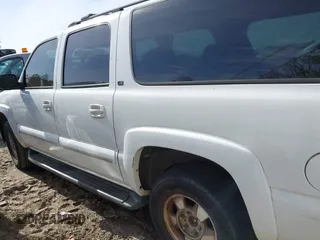 2002 Chevrolet Suburban LS with VIN 3GNEC16Z62G297015, listed as a IAAI auction lot 41756723 with 374,724 mi miles. Bid and sale history available at carsss.com. Image 3.