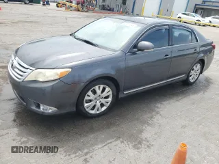 2011 Toyota Avalon with VIN 4T1BK3DB4BU372285, listed as a Copart auction lot 62823345 with 185,586 mi miles and Salvage title. Bid and sale history available at DreamBid. Image 1.