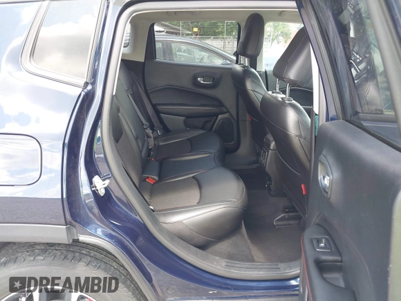 2021 Jeep Compass Trailhawk with VIN 3C4NJDDB0MT590442, listed as a IAAI auction lot 42543530 with 66,669 mi miles and . Bid and sale history available at DreamBid. Image 8.