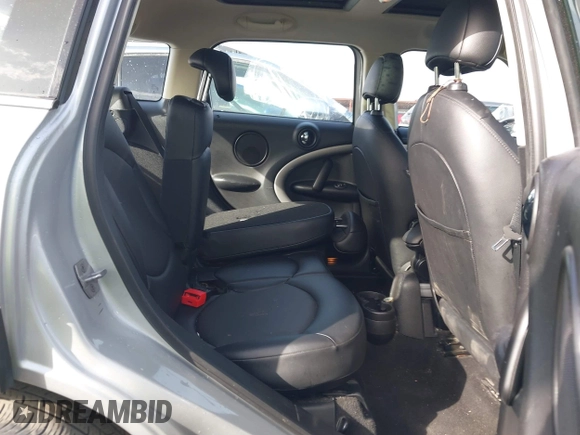 2015 MINI Countryman with VIN WMWZB3C56FWR46360, listed as a IAAI auction lot 41691359 with 88,305 mi miles and . Bid and sale history available at DreamBid. Image 8.