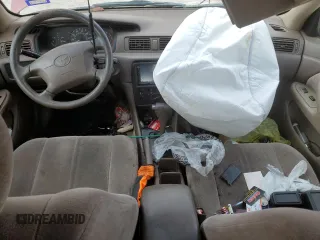 1997 Toyota Camry LE с VIN 4T1BG22K6VU121447, выставлен на аукционе Copart как лот 48847475 с пробегом Не указан миль и Списание • Salvage title. История ставок и продаж доступна на DreamBid. Изображение 8.