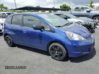 2009 Honda Fit with VIN JHMGE882X9C003678, listed as a Copart auction lot 56688265 with 141,003 mi miles and Salvage title. Bid and sale history available at DreamBid. Image 4.