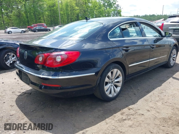2011 Volkswagen CC Sport with VIN WVWMP7AN8BE709541, listed as a IAAI auction lot 42164892 with 154,547 mi miles. Bid and sale history available at carsss.com. Image 4.