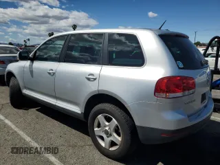 2006 Volkswagen Touareg 3.2L V6 with VIN WVGZG77L76D040164, listed as a Copart auction lot 51551155 with 169,611 mi miles and Salvage Title. Bid and sale history available at DreamBid. Image 2.