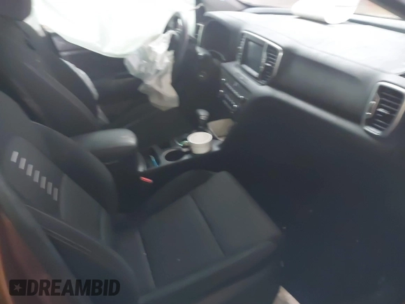 2018 Kia Sportage LX with VIN KNDPMCACXJ7446520, listed as a IAAI auction lot 41568985 with 79,601 mi miles and . Bid and sale history available at DreamBid. Image 5.