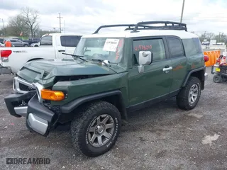 2014 Toyota FJ Cruiser with VIN JTEBU4BF1EK203587, listed as a IAAI auction lot 41978010 with 62,438 mi miles. Bid and sale history available at carsss.com. Image 17.