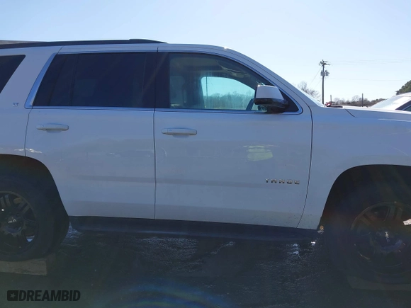 2019 Chevrolet Tahoe LT with VIN 1GNSKBKC7KR307869, listed as a IAAI auction lot 41833834 with 127,949 mi miles. Bid and sale history available at carsss.com. Image 13.
