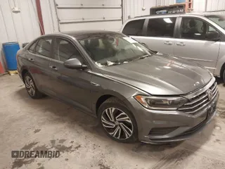 2021 Volkswagen Jetta SEL with VIN 3VWE57BU9MM086571, listed as a IAAI auction lot 41322665 with 33,584 mi miles and . Bid and sale history available at DreamBid. Image 1.