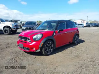 2015 MINI Countryman S with VIN WMWZC3C52FWT05204, listed as a IAAI auction lot 41492775 with 80,785 mi miles and . Bid and sale history available at DreamBid. Image 2.
