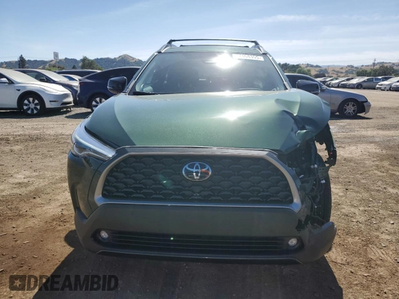 2025 Toyota Corolla Cross XLE with VIN 7MUDAABG2SV124680, listed as a Copart auction lot 57468355 with 2,180 mi miles and Salvage title. Bid and sale history available at DreamBid. Image 5.