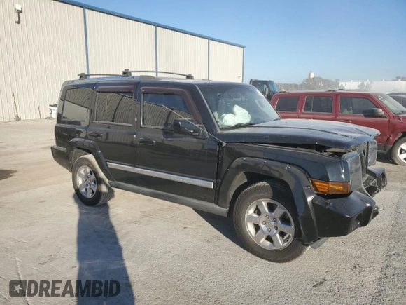 2007 Jeep Commander Overland with VIN 1J8HG68217C619277, listed as a Copart auction lot 82934414 with 136,282 mi miles and Salvage title. Bid and sale history available at DreamBid. Image 4.