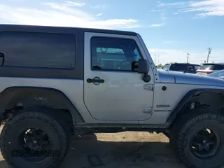 2014 Jeep Wrangler Sport with VIN 1C4AJWAG5EL206565, listed as a IAAI auction lot 42015000 with 90,129 mi miles and . Bid and sale history available at carsss.com. Image 13.