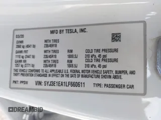 2020 Tesla Model 3 Standard Range Plus z VIN 5YJ3E1EA1LF660611, wystawiony jako IAAI lot #41856495 z przebiegiem 141 086 mil mil oraz . Historia ofert i sprzedaży dostępna na DreamBid. Obrazek 9.