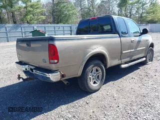 2003 Ford F-150 XL with VIN 1FTRX18L93NA46053, listed as a IAAI auction lot 42003621 with 237,000 mi miles. Bid and sale history available at carsss.com. Image 4.