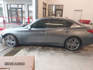 2014 Infiniti Q50 Premium z VIN JN1BV7AR7EM696486, wystawiony jako IAAI lot #41976047 z przebiegiem 145 000 mil mil oraz . Historia ofert i sprzedaży dostępna na DreamBid. Obrazek 13.