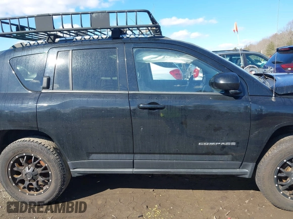 2014 Jeep Compass Latitude with VIN 1C4NJDEB2ED626380, listed as a IAAI auction lot 41675908 with 90,153 mi miles. Bid and sale history available at carsss.com. Image 14.