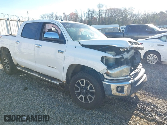 2014 Toyota Tundra 4WD Truck LTD with VIN 5TFHW5F16EX372679, listed as a IAAI auction lot 41736049 with 247,000 mi miles. Bid and sale history available at carsss.com. Image 1.