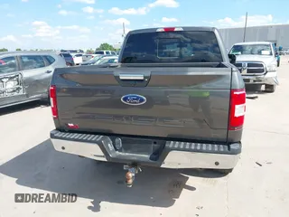 2018 Ford F-150 XL z VIN 1FTEW1E59JKC63060, wystawiony jako IAAI lot #42171237 z przebiegiem 113 405 mil mil oraz . Historia ofert i sprzedaży dostępna na DreamBid. Obrazek 16.
