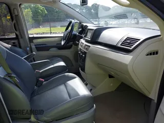 2012 Volkswagen Routan SE with VIN 2C4RVABG3CR293458, listed as a IAAI auction lot 42210411 with 139,390 mi miles and . Bid and sale history available at DreamBid. Image 5.