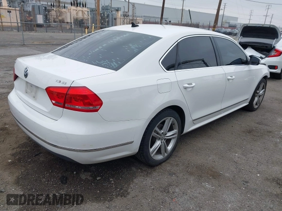 2015 Volkswagen Passat 1.8T SE w/Sunroof & Nav with VIN 1VWBT7A31FC043798, listed as a IAAI auction lot 42108289 with 132,442 mi miles. Bid and sale history available at carsss.com. Image 4.