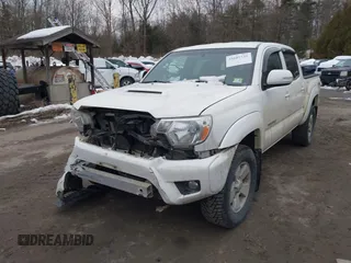 2014 Toyota Tacoma with VIN 3TMLU4EN5EM157590, listed as a IAAI auction lot 41687141 with 111,836 mi miles. Bid and sale history available at carsss.com. Image 6.
