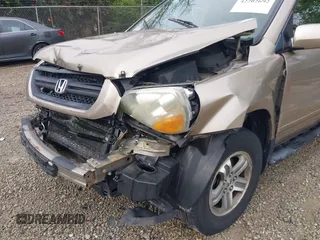 2005 Honda Pilot EX-L z VIN 2HKYF187X5H548431, wystawiony jako IAAI lot #42202692 z przebiegiem 199 889 mil mil oraz . Historia ofert i sprzedaży dostępna na DreamBid. Obrazek 18.