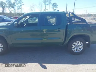 2022 Nissan Frontier SV with VIN 1N6ED1EJ2NN632457, listed as a IAAI auction lot 41694079 with 64,506 mi miles and . Bid and sale history available at DreamBid. Image 14.