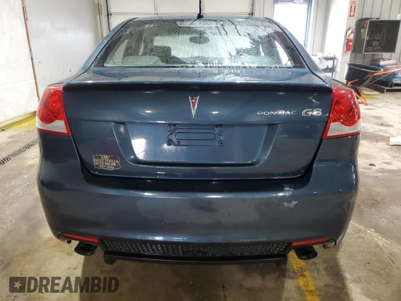 2009 Pontiac G8 with VIN 6G2ER57789L161792, listed as a Copart auction lot 43455795 with 127,236 mi miles and Salvage Title. Bid and sale history available at DreamBid. Image 6.