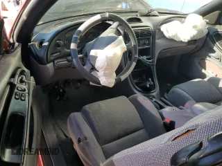 1994 Ford Mustang GT z VIN 1FALP42TXRF226179, wystawiony jako Copart lot #57905014 z przebiegiem 158 454 mil mil oraz Szkoda całkowita • Salvage title. Historia ofert i sprzedaży dostępna na DreamBid. Obrazek 8.