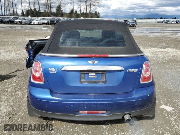 2014 MINI Convertible with VIN WMWZN3C55ET861078, listed as a Copart auction lot 50240665 with 50,541 mi miles and Salvage Title. Bid and sale history available at DreamBid. Image 6.