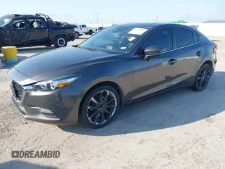 2017 Mazda 3 Touring with VIN 3MZBN1V78HM148831, listed as a IAAI auction lot 42229081 with 56,651 mi miles and . Bid and sale history available at DreamBid. Image 2.