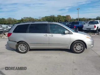 2008 Toyota Sienna XLE with VIN 5TDZK22C18S161339, listed as a IAAI auction lot 41449450 with 202,512 mi miles. Bid and sale history available at carsss.com. Image 13.