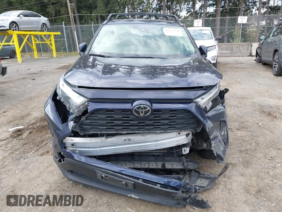 2023 Toyota RAV4 XLE with VIN JTMP1RFV1PD095688, listed as a IAAI auction lot 41874720 with 59,737 mi miles. Bid and sale history available at carsss.com. Image 12.