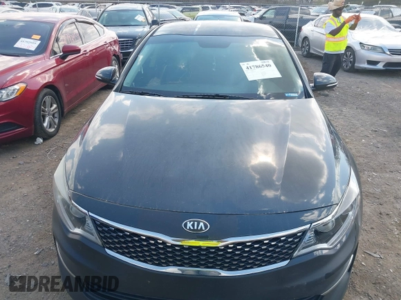 2016 Kia Optima EX with VIN 5XXGU4L30GG014019, listed as a IAAI auction lot 41786540 with 112,894 mi miles and . Bid and sale history available at carsss.com. Image 12.