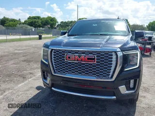 2021 GMC Yukon Denali with VIN 1GKS2DKL7MR471280, listed as a IAAI auction lot 40189766 with 126,591 mi miles. Bid and sale history available at carsss.com. Image 12.