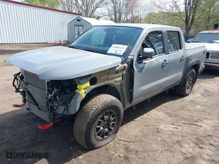 2023 Nissan Frontier PRO-4X with VIN 1N6ED1EKXPN674662, listed as a IAAI auction lot 42001624 with 24,928 mi miles. Bid and sale history available at carsss.com. Image 18.