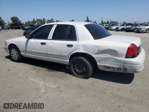 2011 Ford Police Interceptor with VIN 2FABP7BV4BX167977, listed as a Copart auction lot 61819025 with 104,769 mi miles and Salvage title. Bid and sale history available at DreamBid. Image 2.