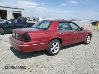 2003 Ford Crown Victoria LX z VIN 2FAFP74W43X100336, wystawiony jako Copart lot #51004035 z przebiegiem 82 089 mil mil oraz Szkoda całkowita • Salvage title. Historia ofert i sprzedaży dostępna na DreamBid. Obrazek 3.