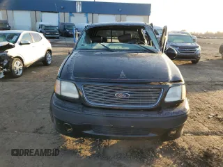 2001 Ford F-150 SuperCrew XLT with VIN 1FTRW07L71KA04123, listed as a Copart auction lot 48477755 with 128,808 mi miles and Clean Title. Bid and sale history available at carsss.com. Image 5.