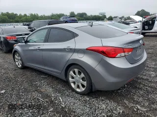 2013 Hyundai Elantra GLS z VIN KMHDH4AE0DU694906, wystawiony jako Copart lot #61286785 z przebiegiem 145 020 mil mil oraz Czysty tytuł • Clean title. Historia ofert i sprzedaży dostępna na DreamBid. Obrazek 2.