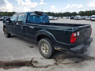 2014 Ford F-250 XL with VIN 1FT7W2A6XEEB36013, listed as a Copart auction lot 62713075 with 245,865 mi miles and Salvage title. Bid and sale history available at DreamBid. Image 2.