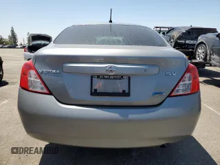 2012 Nissan Versa SV with VIN 3N1CN7AP8CL818508, listed as a Copart auction lot 63164515 with 94,455 mi miles and Salvage title. Bid and sale history available at DreamBid. Image 6.