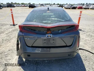 2021 Toyota Prius LE z VIN JTDKAMFPXM3190346, wystawiony jako Copart lot #57626675 z przebiegiem 102 786 mil mil oraz Szkoda całkowita • Salvage title. Historia ofert i sprzedaży dostępna na DreamBid. Obrazek 6.