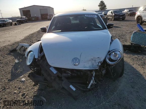 2016 Volkswagen Beetle Turbo R-Line with VIN 3VWVT7AT9GM602303, listed as a Copart auction lot 63845354 with 65,796 mi miles and Salvage Title. Bid and sale history available at DreamBid. Image 5.