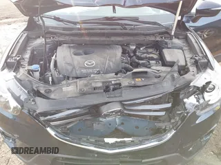 2016 Mazda CX-5 Grand Touring with VIN JM3KE4DY1G0823989, listed as a IAAI auction lot 41770149 with 40,677 mi miles. Bid and sale history available at carsss.com. Image 10.
