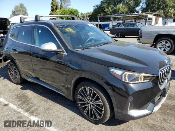 2023 BMW X1 xDrive28i with VIN WBX73EF05P5W78138, listed as a Copart auction lot 62868065 with 12,534 mi miles and Salvage title. Bid and sale history available at DreamBid. Image 4.